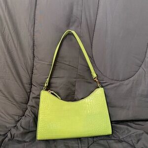 Lime green shoulder bag.